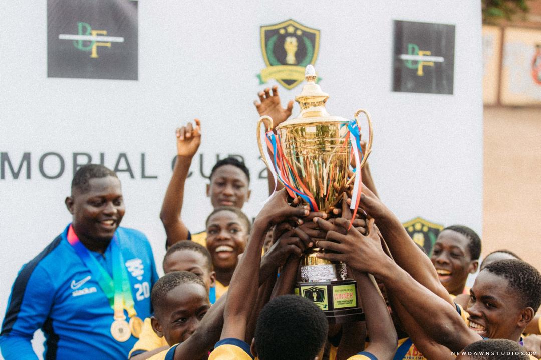 Stallion Stars FC celebrating with a trophy